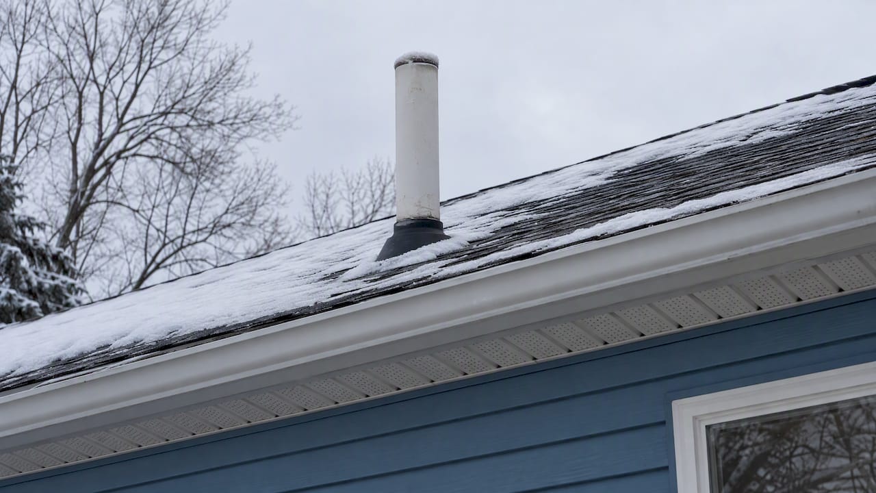 Frosted vent stack above a Pittsburgh home
