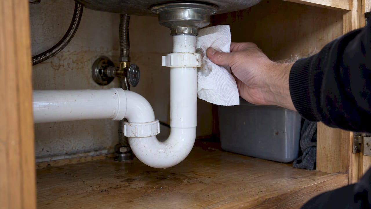 Paper towel tracing a sink joint leak